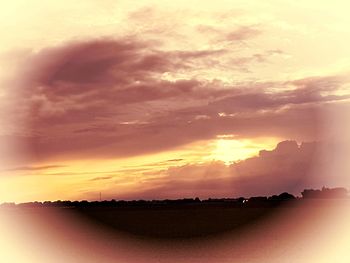 Scenic view of silhouette landscape against sky during sunset