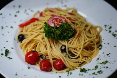 Close-up of noodles served in plate