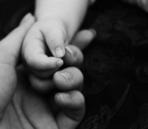 Cropped image of woman holding baby