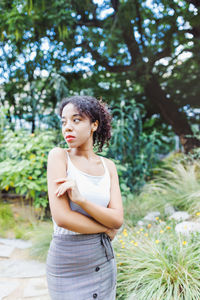 Young multiracial african american woman in park, summer