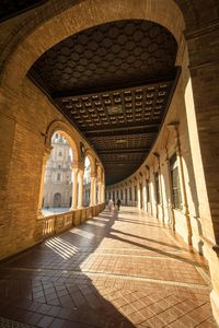 Interior of historic building, corridor of plaza de españa in seville