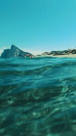 View of sea against blue sky