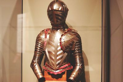 Midsection of man standing in museum