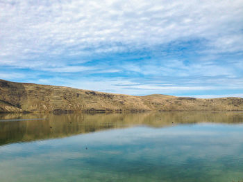 Scenic view of lake against sky