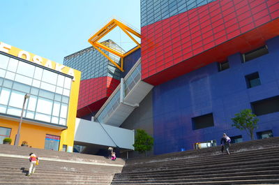 Low angle view of built structures against clear sky