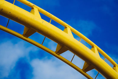 High section of built structure against blue sky