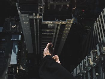 Low section of man standing on floor