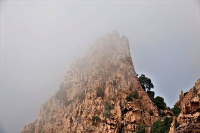 Panoramic view of mountains against sky