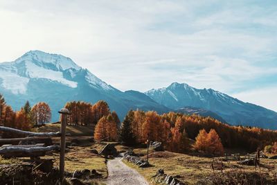 Scenic view of snowcapped mountains against sky