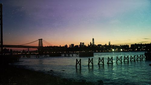 Bridge over river at night