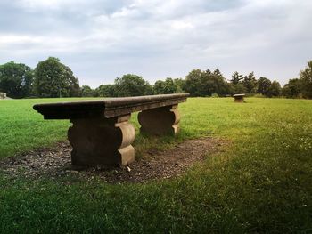 Built structure on field against sky