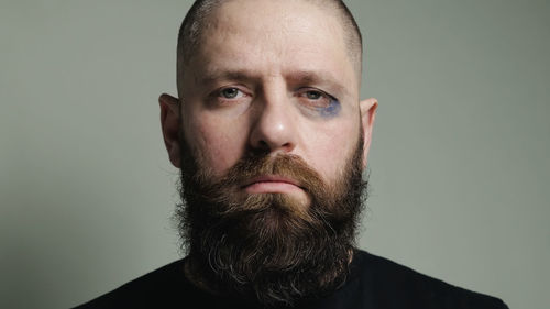 Portrait of a man against blue background