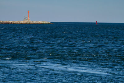 Scenic view of sea against clear sky