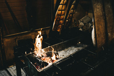 High angle view of meat on barbecue grill