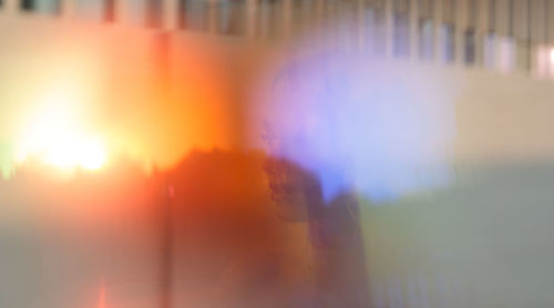 Defocused image of sun shining through window