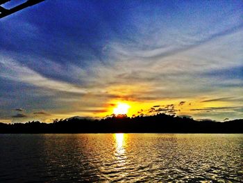 Scenic view of sunset over sea