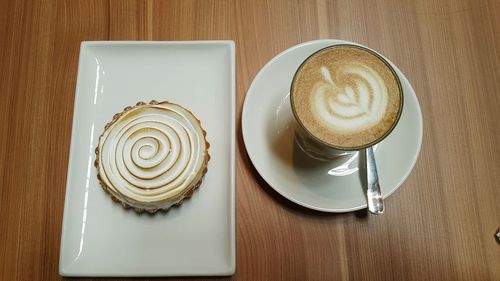 High angle view of cappuccino on table