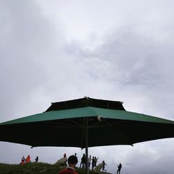 People at town square against sky