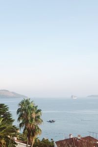 Scenic view of bay against clear sky