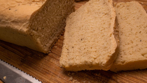 High angle view of bread on cutting board