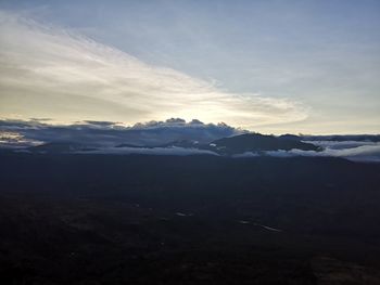 Scenic view of mountains against sky during winter