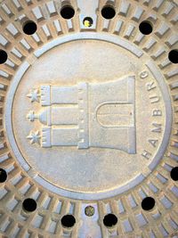 Close-up of carvings on brick wall