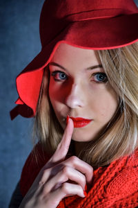 Close-up portrait of a beautiful young woman looking away