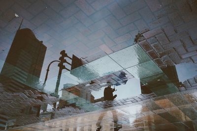 Low section of man walking in building
