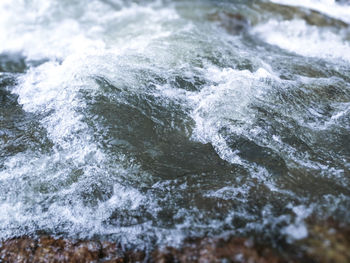 Close-up of wave in water