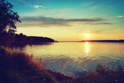 Scenic view of sunset over river