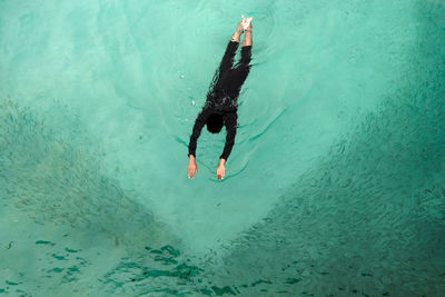 High angle view of person swimming in sea