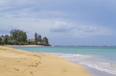 Scenic view of beach against sky