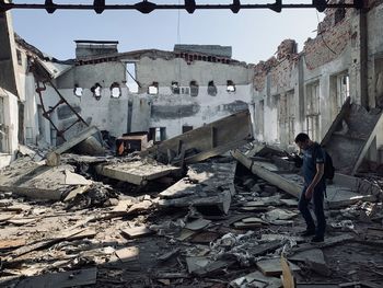 Man walking in old building