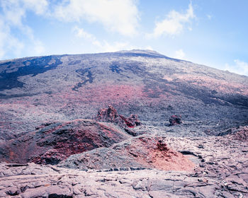 Scenic view of volcanic landscape against sky