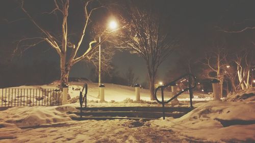 Illuminated street light at night