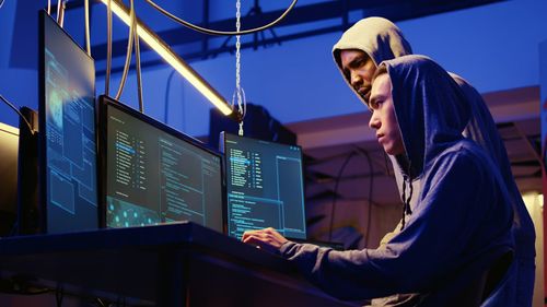 Rear view of people in city