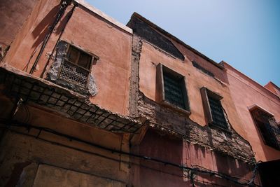 Low angle view of old building against sky
