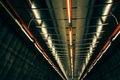 Low angle view of illuminated ceiling at subway station