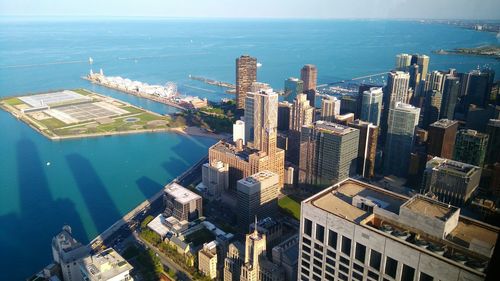 View of sea with buildings in background