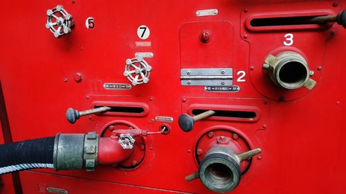 Full frame shot of control panel red vintage firefighters car