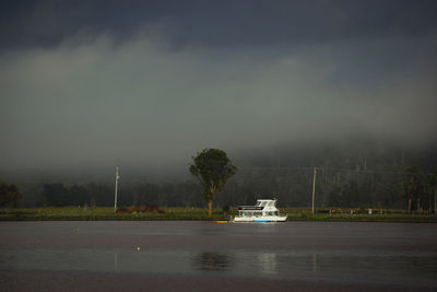 Ship in sea against sky