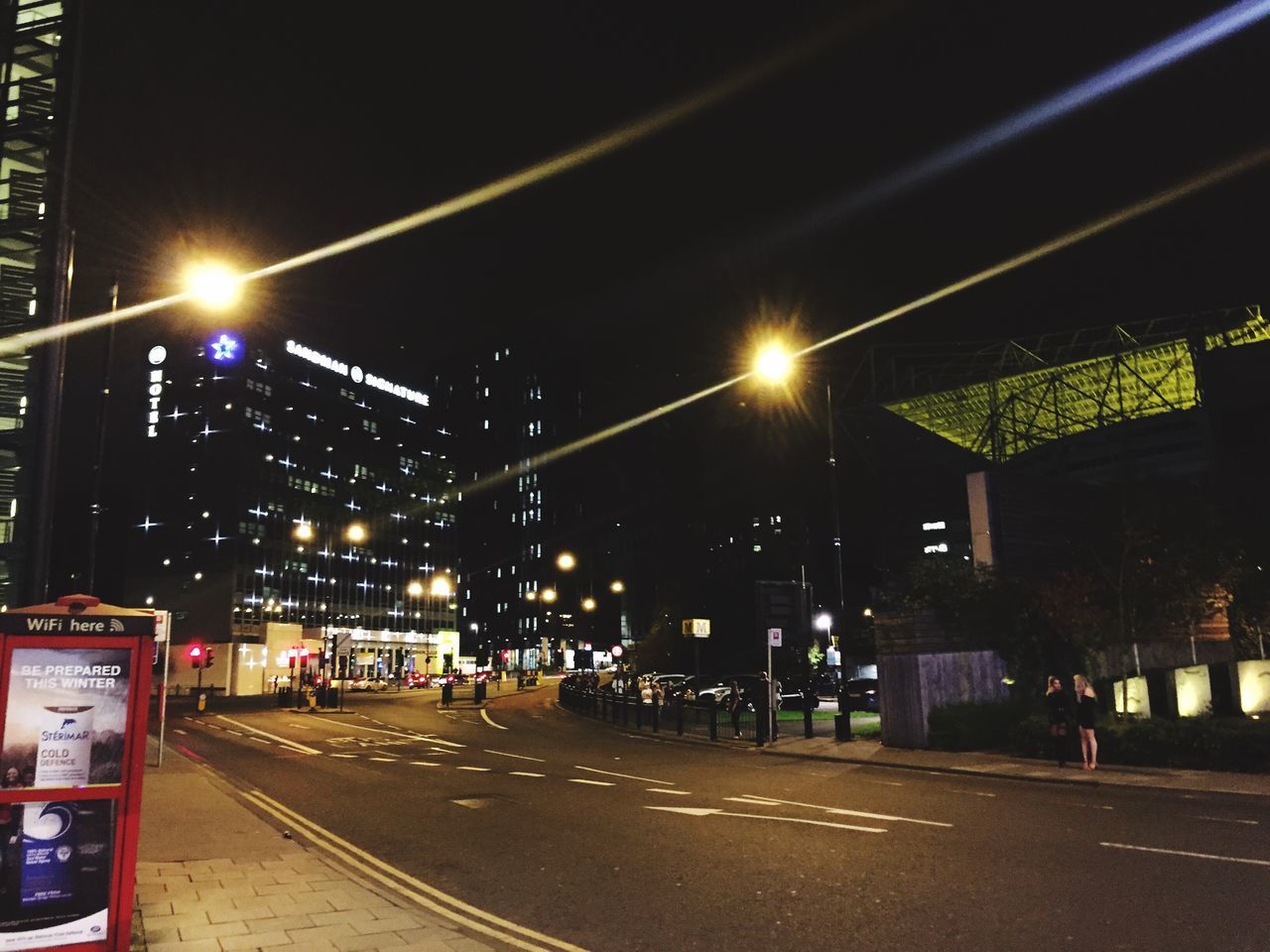 ILLUMINATED STREET AT NIGHT