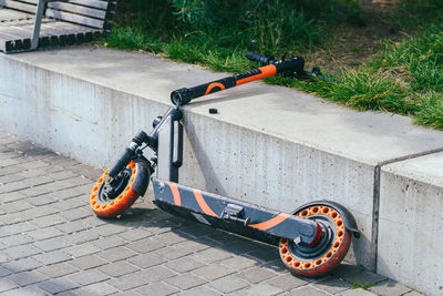 High angle view of toy car on footpath in yard