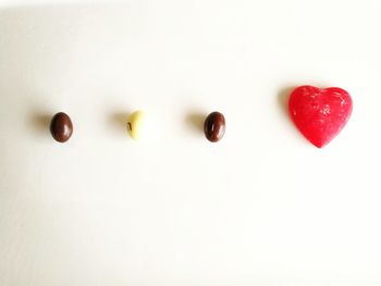 Close-up of heart shape over white background