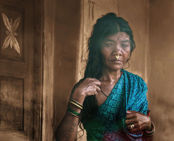 Mature woman wearing sari looking away