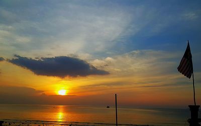 View of calm sea at sunset