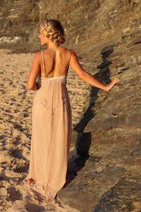 Woman standing on rock