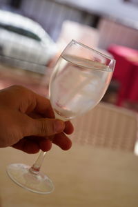 Close-up of hand holding drink