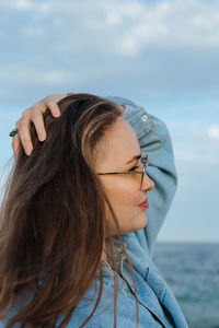 Close-up of young woman looking away