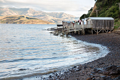 Scenic view of sea against mountains